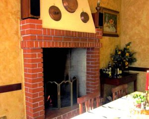 sala camino aperto trattoria Belotti